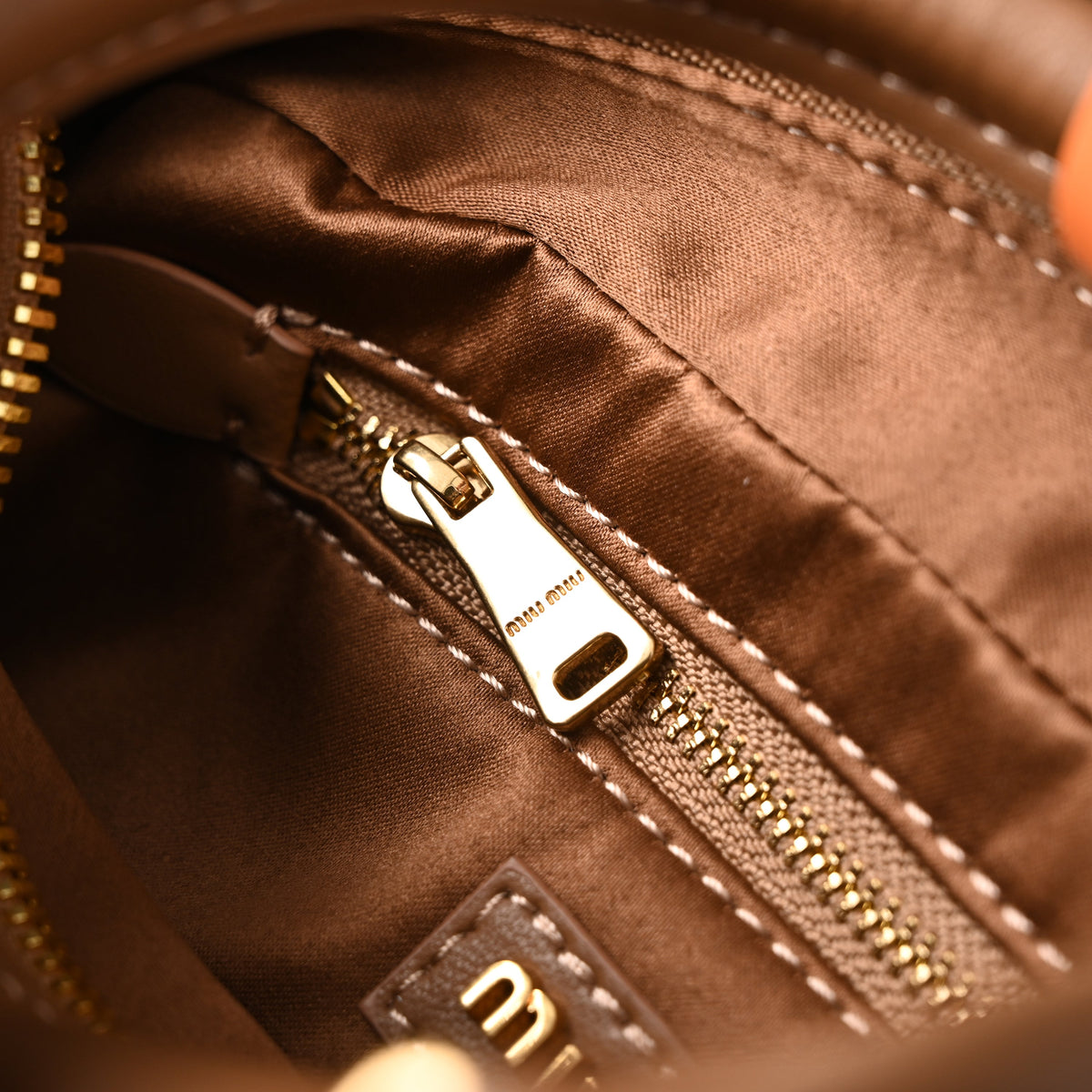 miu-miu-matelasse-leather-top-handle-bag-caramel-brown Handle