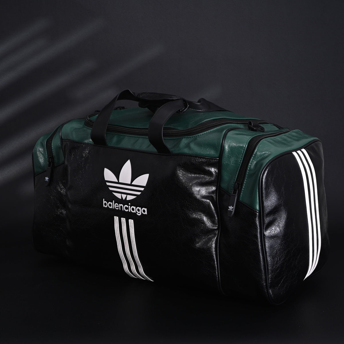 balenciaga-x-adidas-large-duffel-travel-bag-black-green-with-trefoil-logo-and-triple-stripes Handle