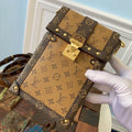 vertical-trunk-pochette-1 Crossbody